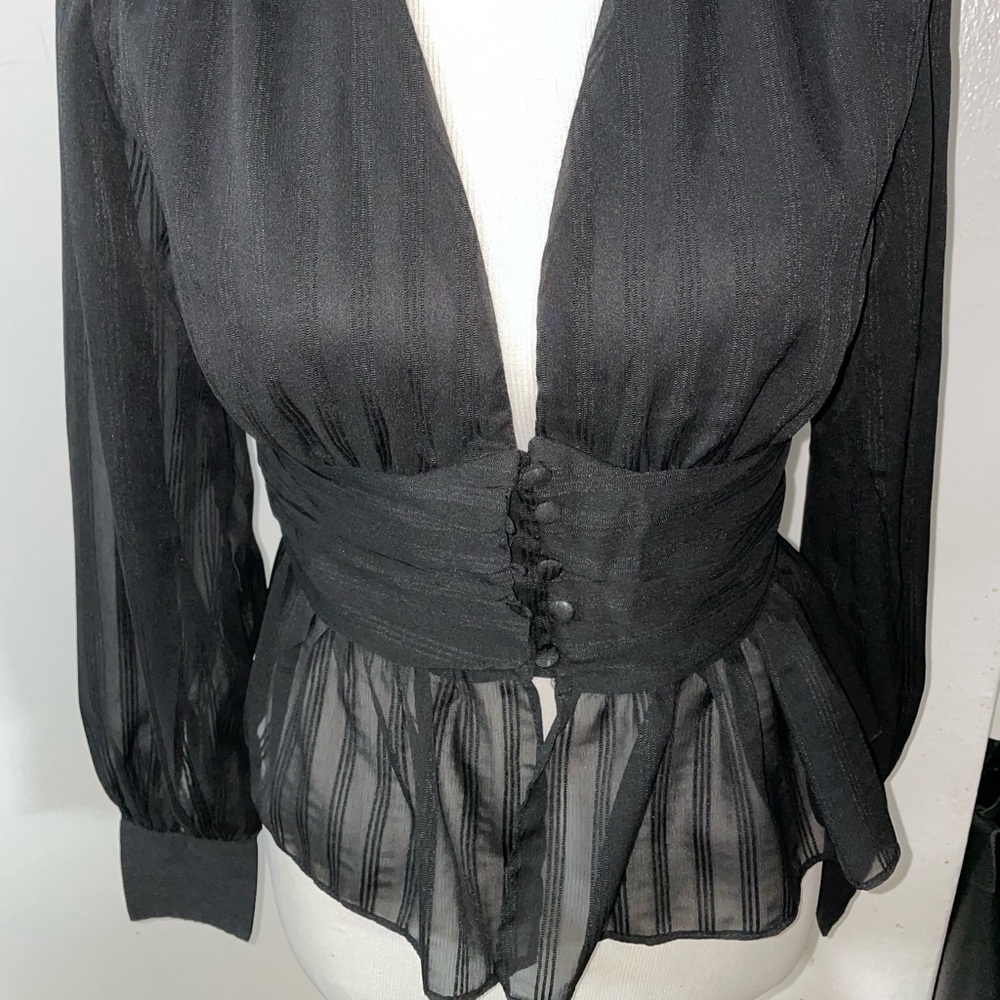 Black woven striped peplum top with button